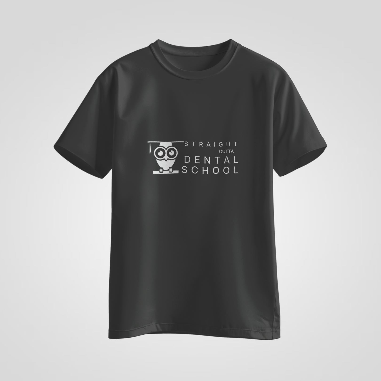 Black t-shirt with 'Straight Outta Dental School' text and owl graphic on a light gray background